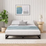 Contemporary Japanese-inspired low bed setup with natural wood elements.