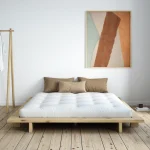 Japanese low platform bed for minimalist bedroom interiors.