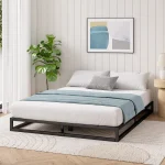 Minimalist Japanese low bed with wooden frame and floor-level design.