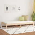 Minimalist single bed frame with a neutral-colored duvet.